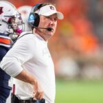 Hugh Freeze coaches during a game in 2024.