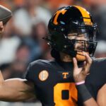 Nico Iamaleava throws a pass.