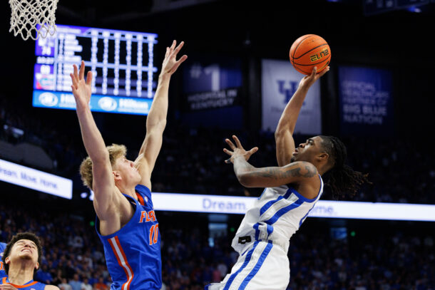 Otega Oweh shoots over Thomas Haugh.