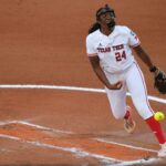 NiJaree Canady throws a pitch at the Women's College World Series.