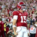 Ty Simpson celebrates an Alabama touchdown.