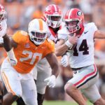 Gunner Stockton runs with the ball.